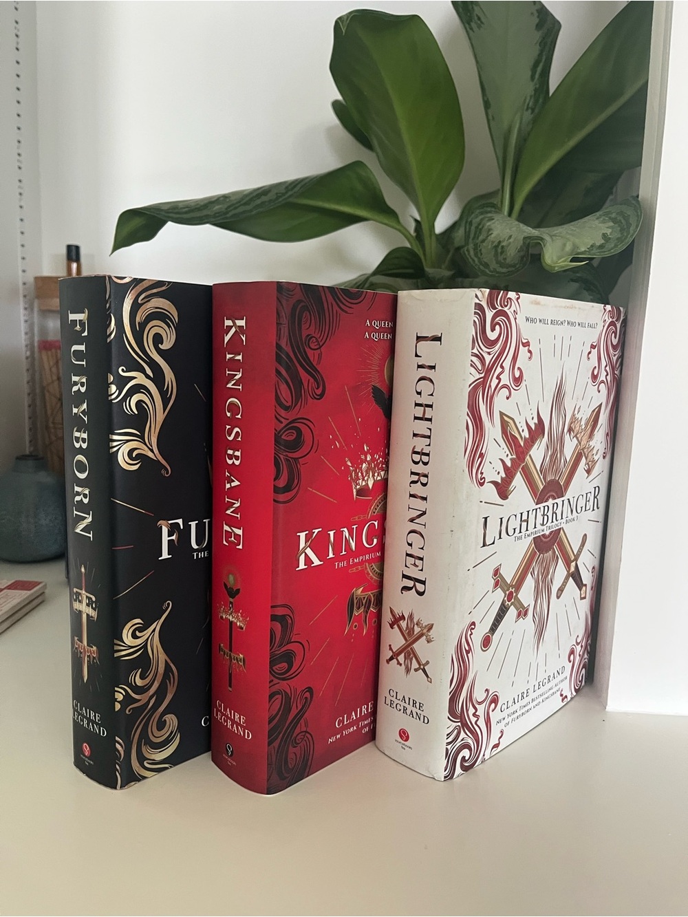 The Empirium Trilogy by Claire Legrand (Furyborn, Kingsbane, Lightbringer)